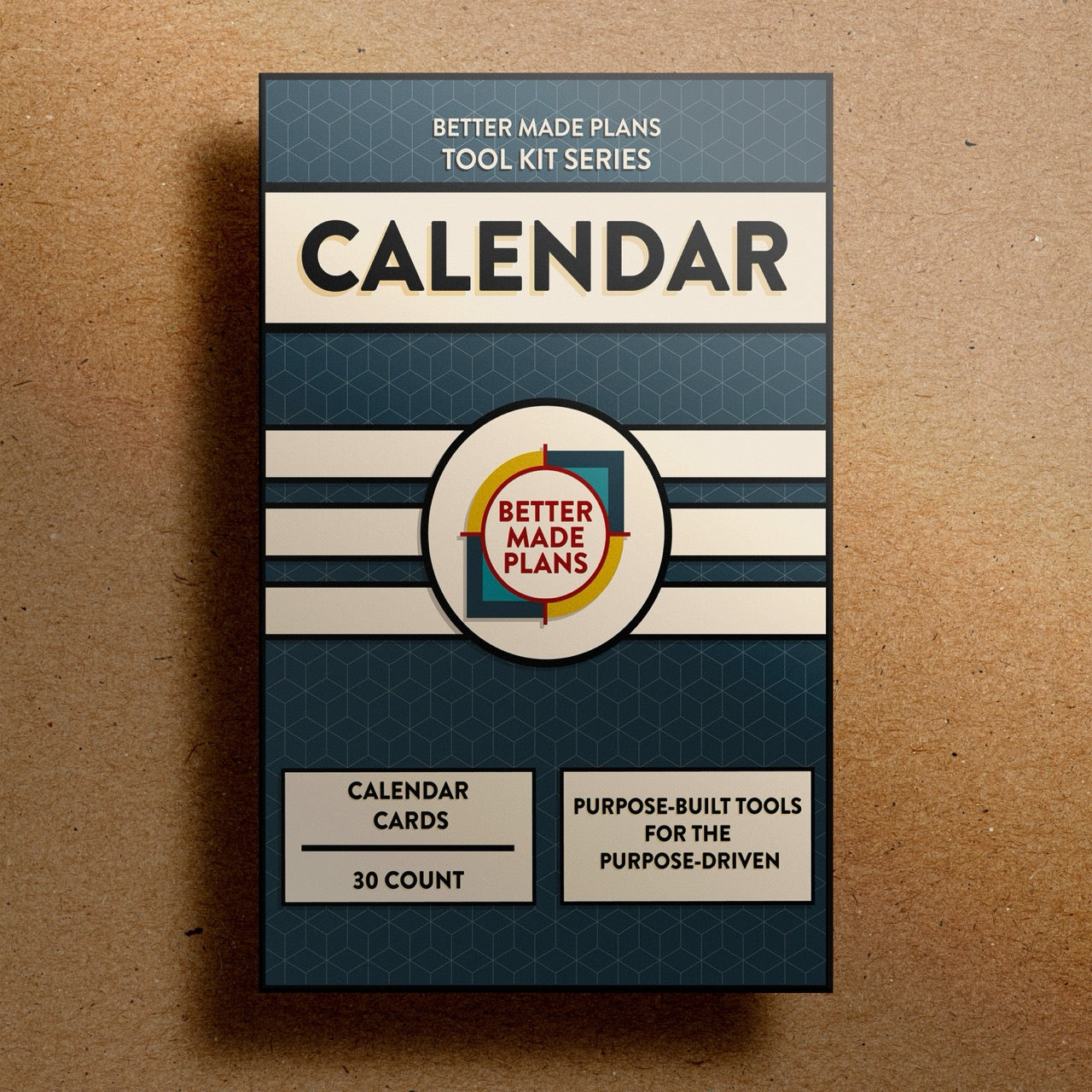 Better Made Plans Tool Kit Series Calendar Edition planner packaging on a brown background.