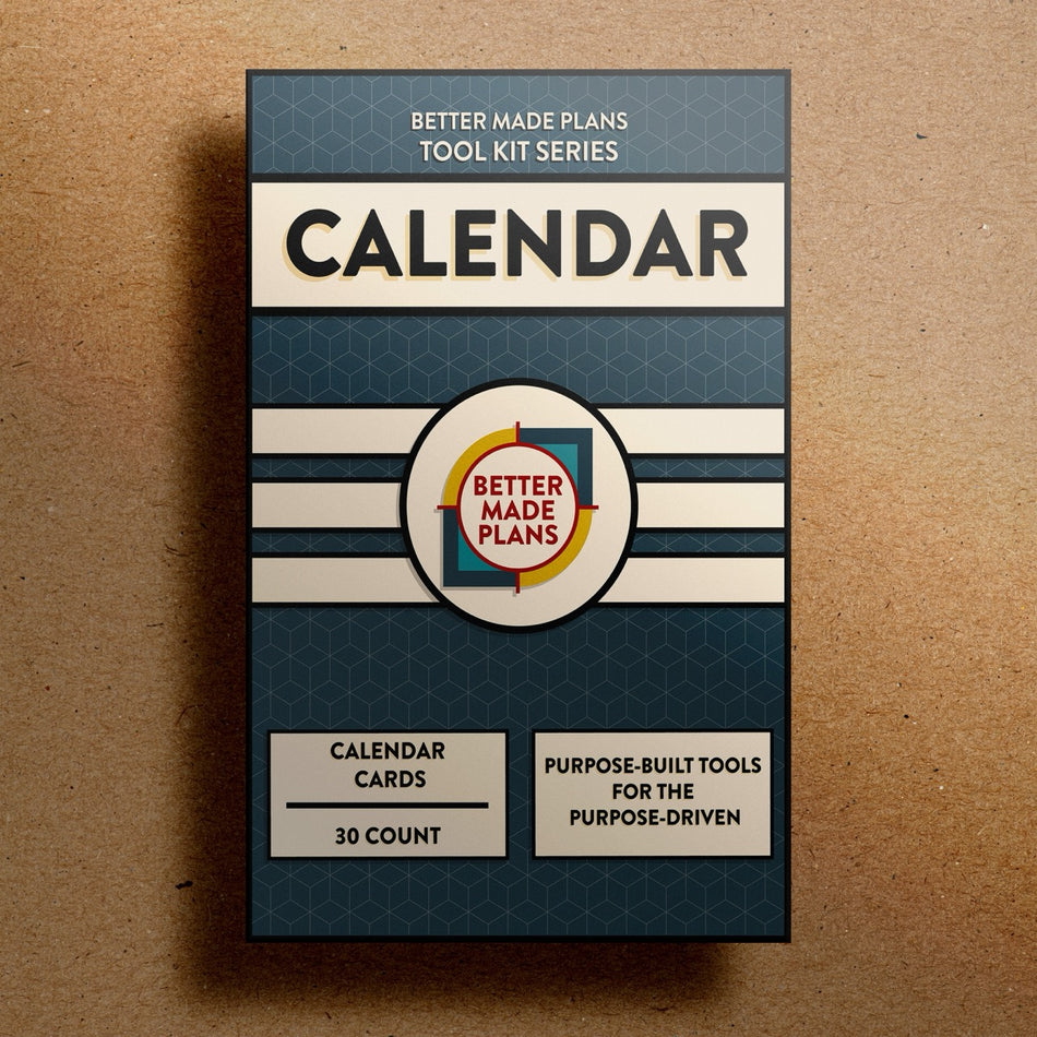 Better Made Plans Tool Kit Series Calendar Edition planner packaging on a brown background.