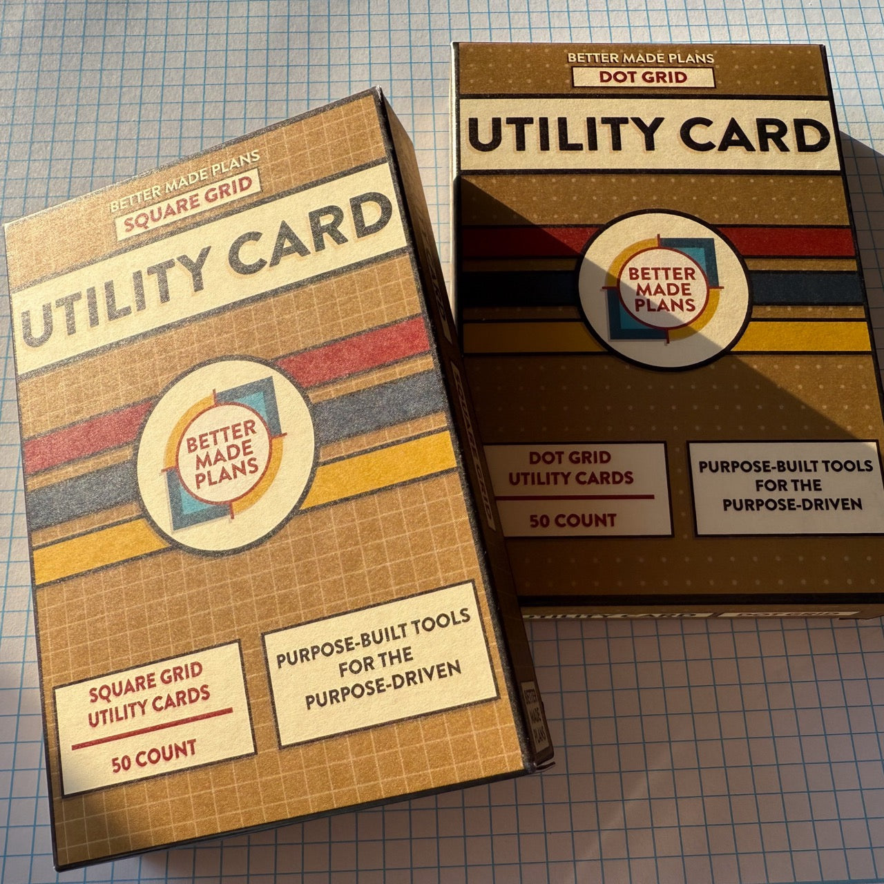 Packaging for Better Made Plans Utility Card Series dot grid and square grid cards on a graph paper background.