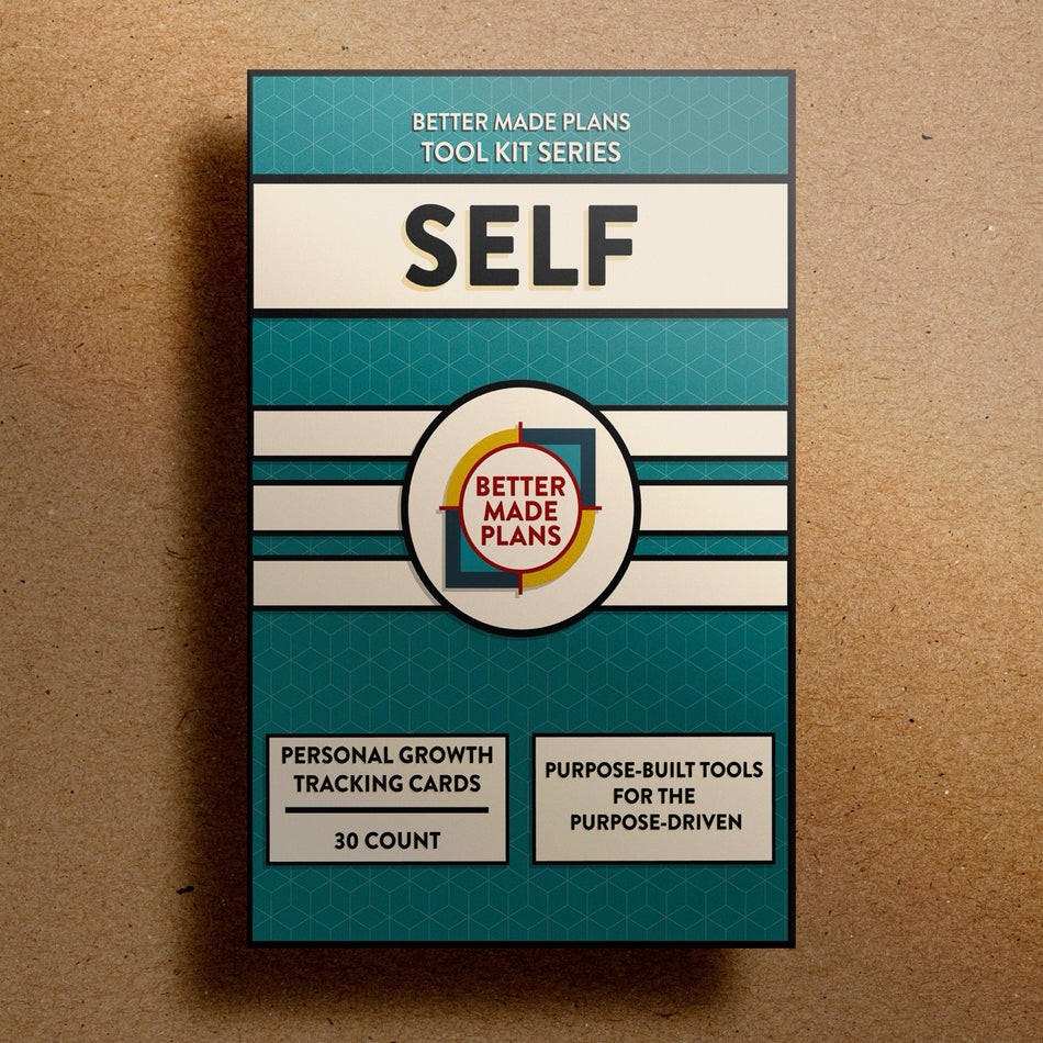 Better Made Plans Tool Kit Series Self Edition planner packaging on a brown background.