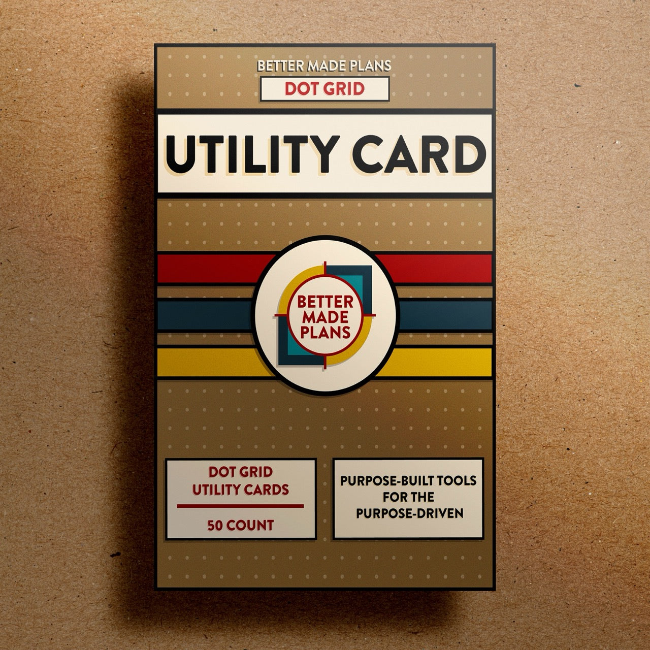Better Made Plans Utility Card Series Dot Grid Edition planner packaging on a brown background.