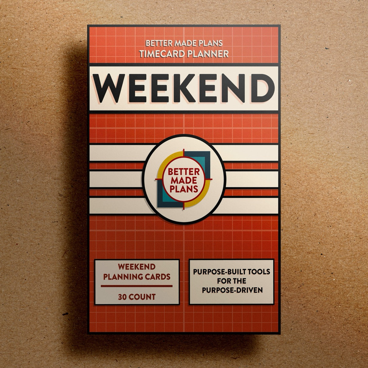 Better Made Plans Timecard Series Weekend Edition planner packaging on a brown background.