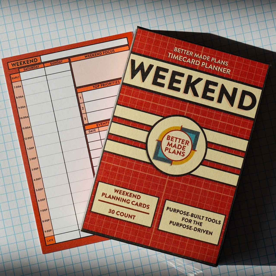Better Made Plans Weekend Planner planning card with packaging on grid background