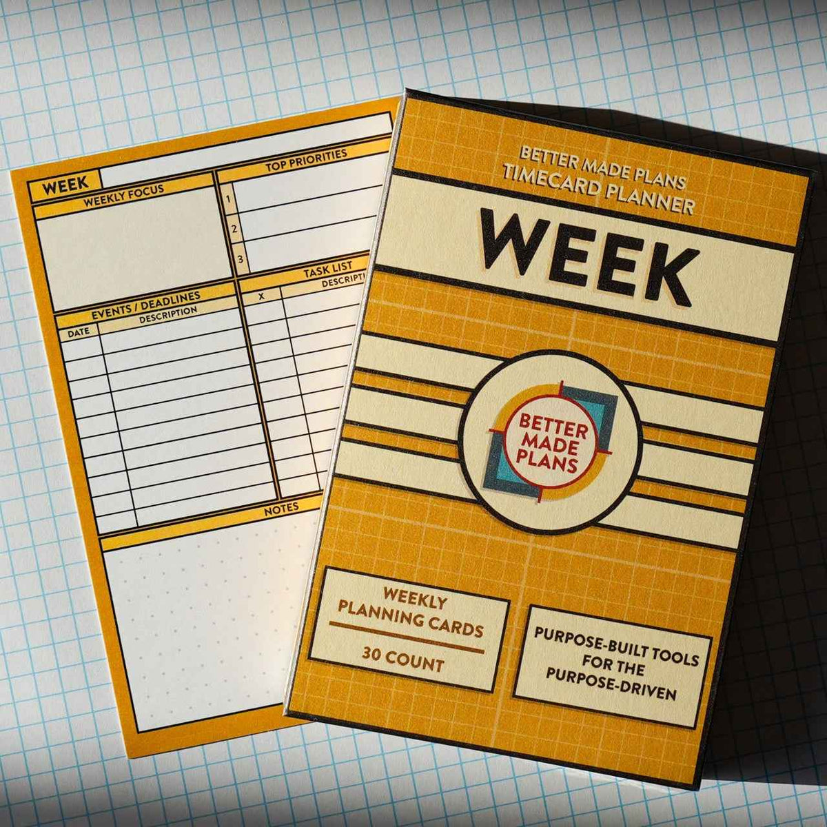 Better Made Plans Week Planner planning card with packaging on grid background