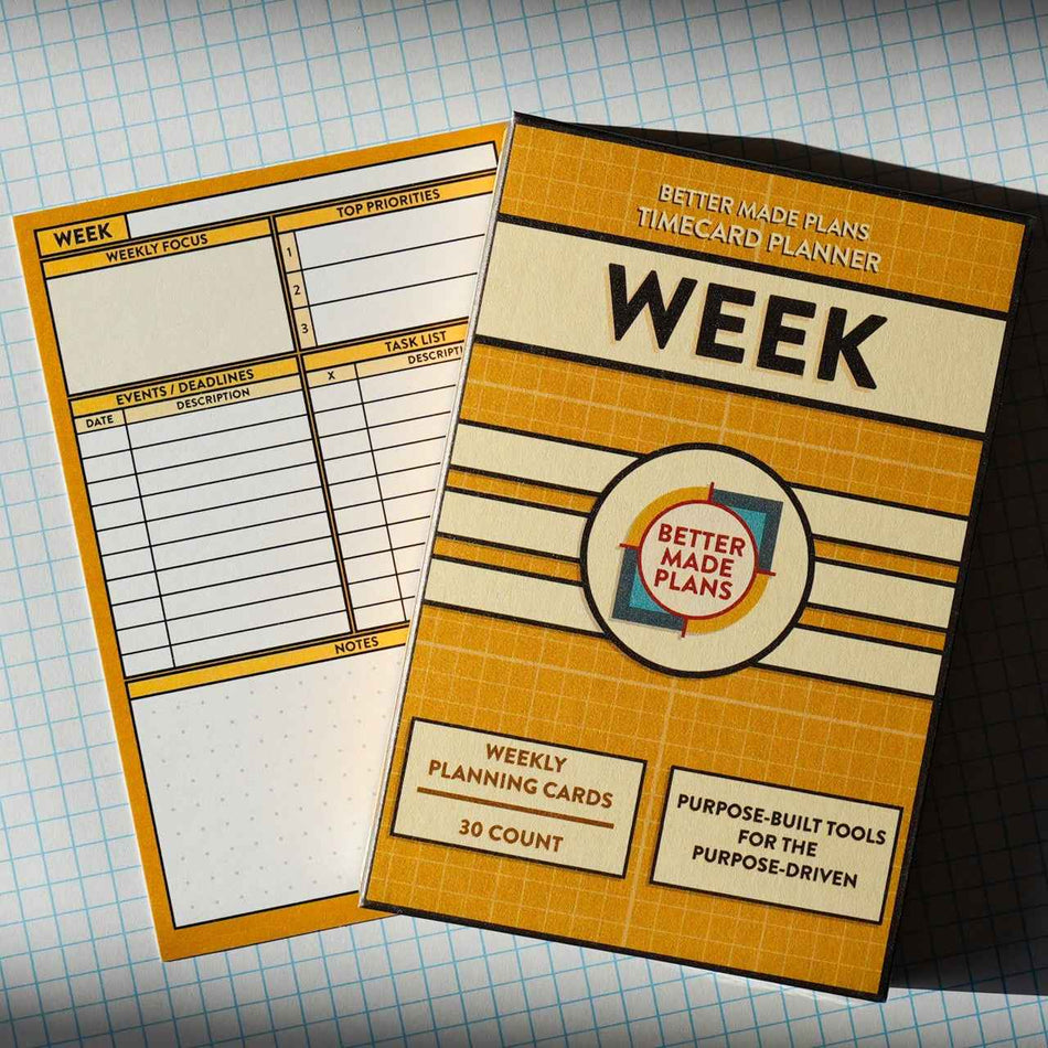 Better Made Plans Week Planner planning card with packaging on grid background